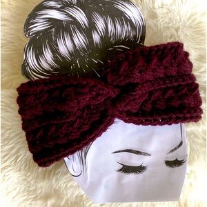 Hand made, crocheted Twisted style headband ear warmer in deepest burgundy.